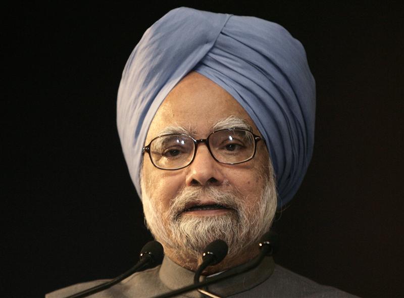 India's PM Singh speaks during India Economic Summit in New Delhi